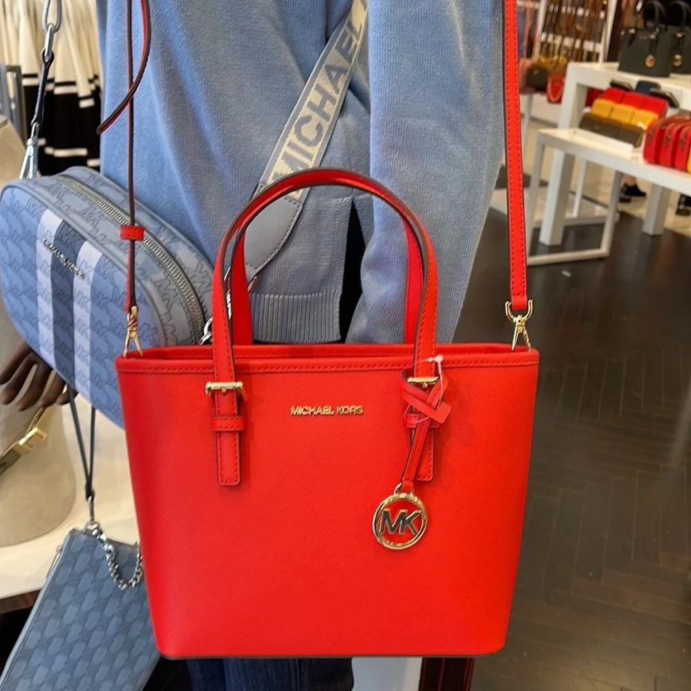 MICHAEL KORS
Jet Set Travel Extra-Small Saffiano Leather Top-Zip Tote Bag
NWT - Picture 10 of 16